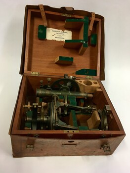 Surveying equipment in fitted timber box and leather outer casing