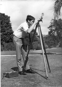 Photograph - Black and white print, Information Branch, Victorian Department of Agriculture, Student Using Dumpy Level, 1967