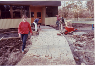 Photograph - Colour print, James (Jim) Pleasance, Students Building Brick Paths Around Relocatable Buildings, 1985