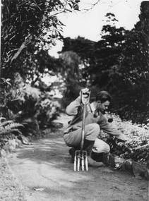 Photograph - Black and white print, E.M. Gibson, Ian Murray Working in the Ornamental Garden, 1950-1951
