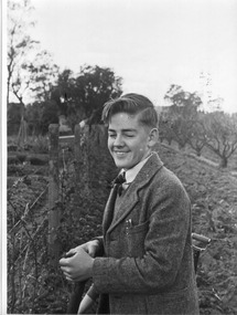 Photograph - Black and white print, E.M. Gibson, Bill Goodman in the Orchard, c. 1949