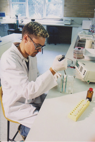 Photograph - Colour print, Student in the Laboratory, Unknown