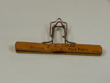 trouser hanger with local advertising of merchant store in Port Fairy