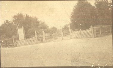 Photo taken on an angle of the entrance gates to the botanical gardens 