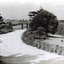 Black and white photograph of the entrance to the gardens . This is an enhanced copy