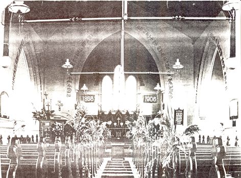Black and white photograph of St John's Church of England Interior decorated for Easter