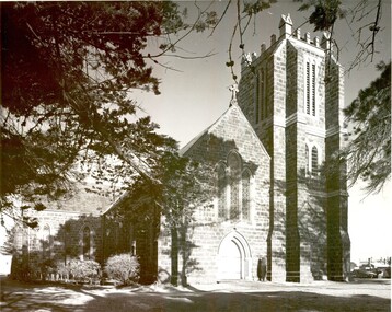 Black and white photograph of St Johns Church of England with tower