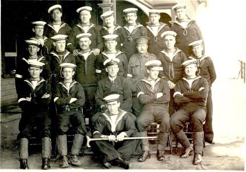 Group of men dressed in Naval reserve uniform