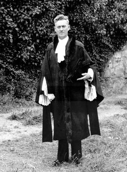 Black and white photograph of male in town clerks robes