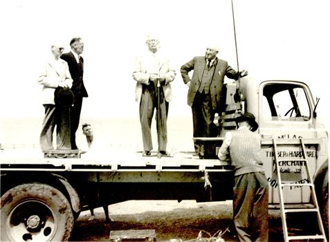 4 men standing on the bed of jack Mclaren’s truck