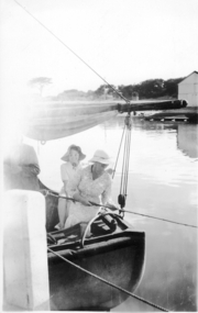 Two ladies at stern of boat fishing