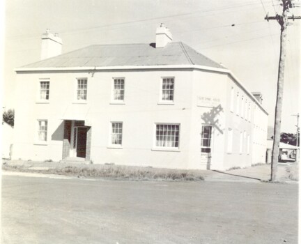 black and white photograph of The Sackville Street frontage of Seacombe House with power pole on extreme right