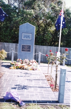 Soldier’s memorial with flowers during Anzac Day