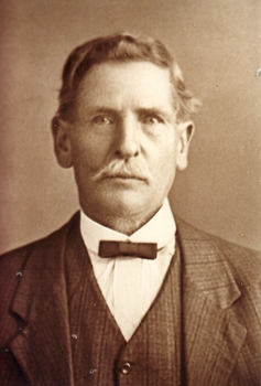 Portrait of gentleman clean shaven with neat bow tie 