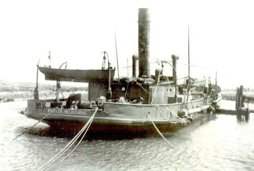 Back view of the dredge called “Pioneer” working in the Moyne river