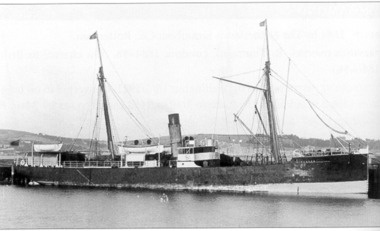 Ship with derrick and masts 
