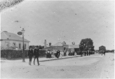 Corner of Bank Street and Sackville Street showing houses on the left side of Bank Street with the mill at the end.