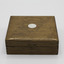 Closed light coloured wooden box with escutcheon on lid