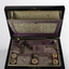 sewing box showing the fabric covered lids on the dividers and ruched insert sitting forward possibly somewhere to put patterns for embroidery 