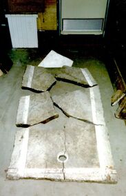 Broken marble base of bath from bath house in Bank Street