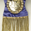 Detail-badge at bottom of sash