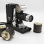 Small film projector with 3 film tins