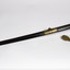 Sword in scabbard with a rope of gold thread ending with a tassel, brass point, brass decoration in centre of scabbard and brass hilt
