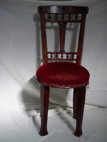 Chair with threads from velvet hanging