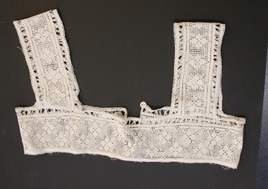 crocheted flower lace panel includes wide shoulder straps 