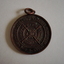 Reverse side of a copper medal for Royal Life Saving Society
