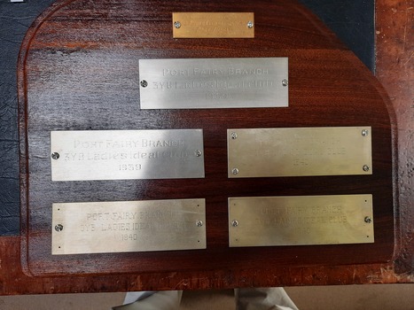 Overall view of all plaques attached to shield