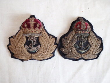 Two embroidered badges from naval uniform