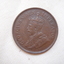 King George V portrait with text around rim