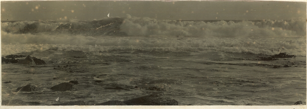 Black and white photograph of the Southern Ocean crashing on the reef