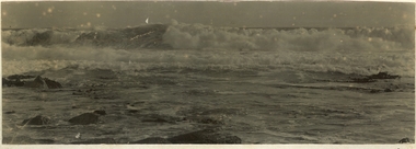 Black and white photograph of the Southern Ocean crashing on the reef