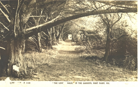 Black and white photograph of the path running on the river side of the botanical gardens
