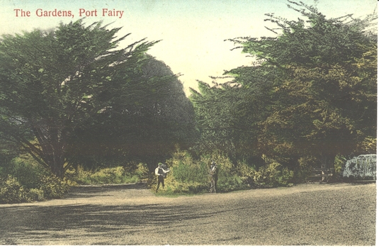 Two men working in the Botanical Gardens at the fork in the path