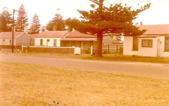 Coloured photograph of a row of houses in Campbell Street