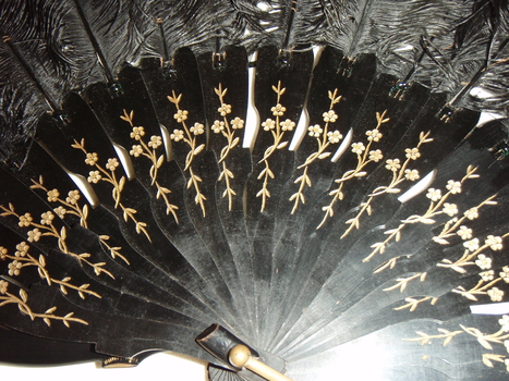 Close up of repeated gold floral design on slats