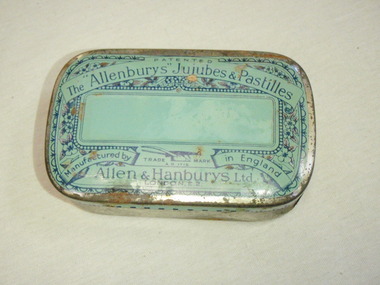 Retangular with rounded corners tin painted pale blue with navy writing on face