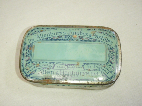 Retangular with rounded corners tin painted pale blue with navy writing on face
