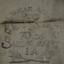 Reverse side of apron showing the brand from the sugar company that produced it