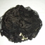 Black lacy net hat with wax flower 