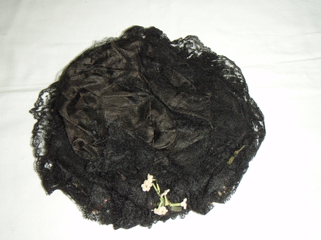 Black lacy net hat with wax flower 