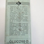 Side of Glucodin tin describing the dosage recommended and manufacturers marks