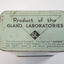 Top of tin with product of Glaxo laboratories and their trademark(s)