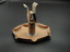 View of ashtray and matchbox holder from the side