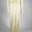 wedding dress with long sleeves and train in front