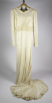wedding dress with long sleeves and train in front