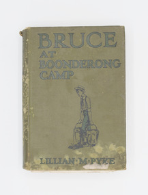 Book with green cover with an outline drawing of a boy carrying two buckets of water